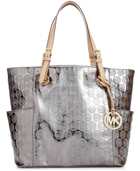 michael kors east west patent leather tote|Michael Kors voyager signature tote.